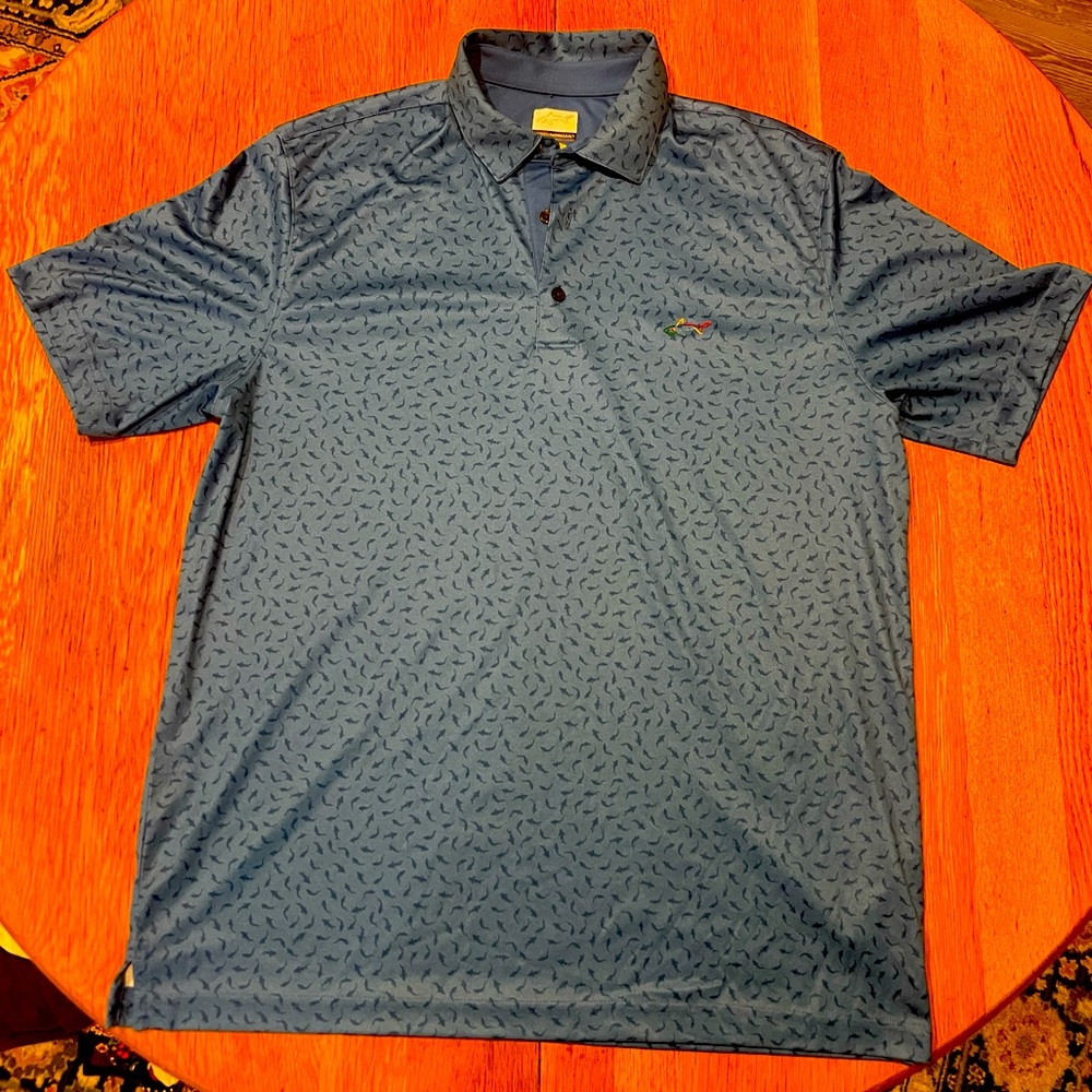 Greg Norman PlayDry golf shirt. Blue, shark pattern. Men’s Large.
